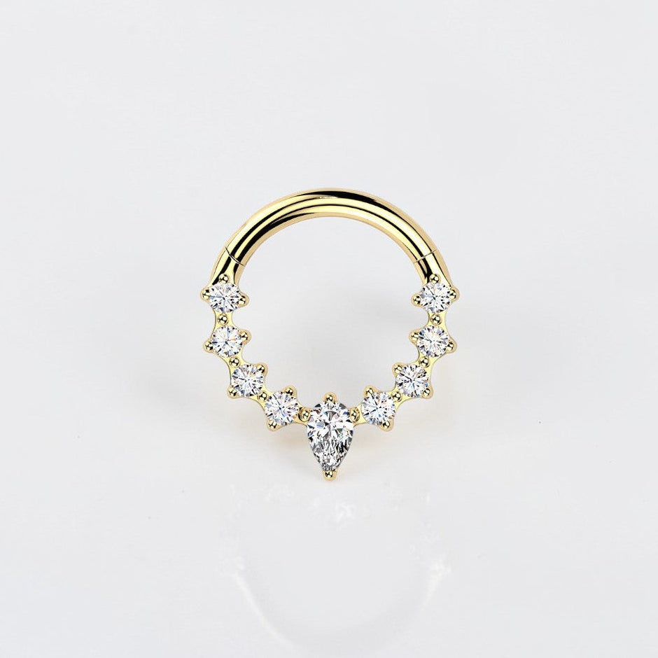 Elara Body Jewelry gold teardrop septum ring with clear CZ stones, hinged segment design.