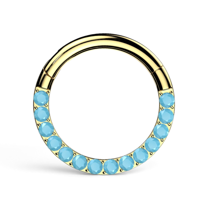 Gold daith clicker with row of turquoise-blue colored stones along the front of the hoop