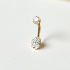 gold belly button ring with oval center moissanite