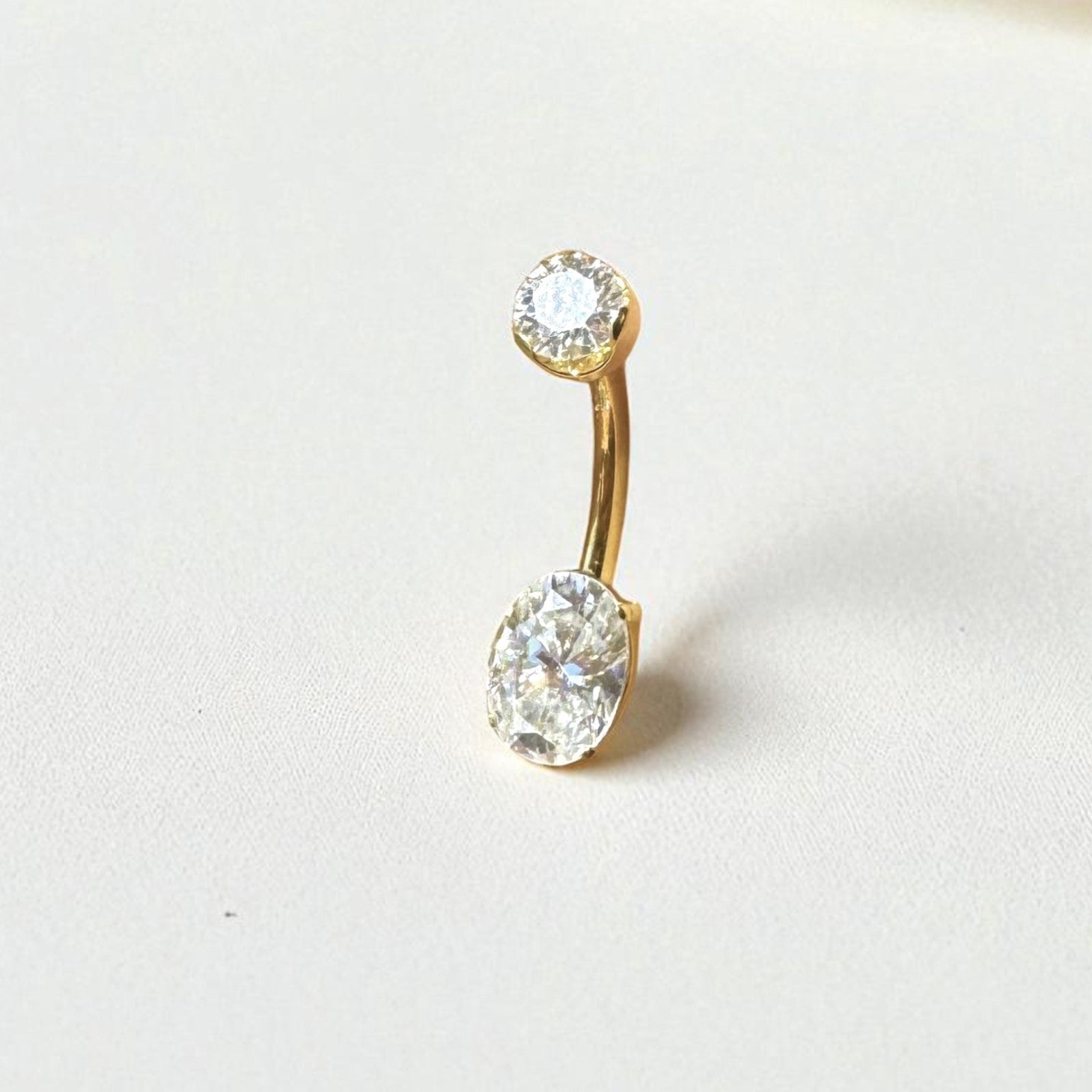 gold belly button ring with oval center moissanite