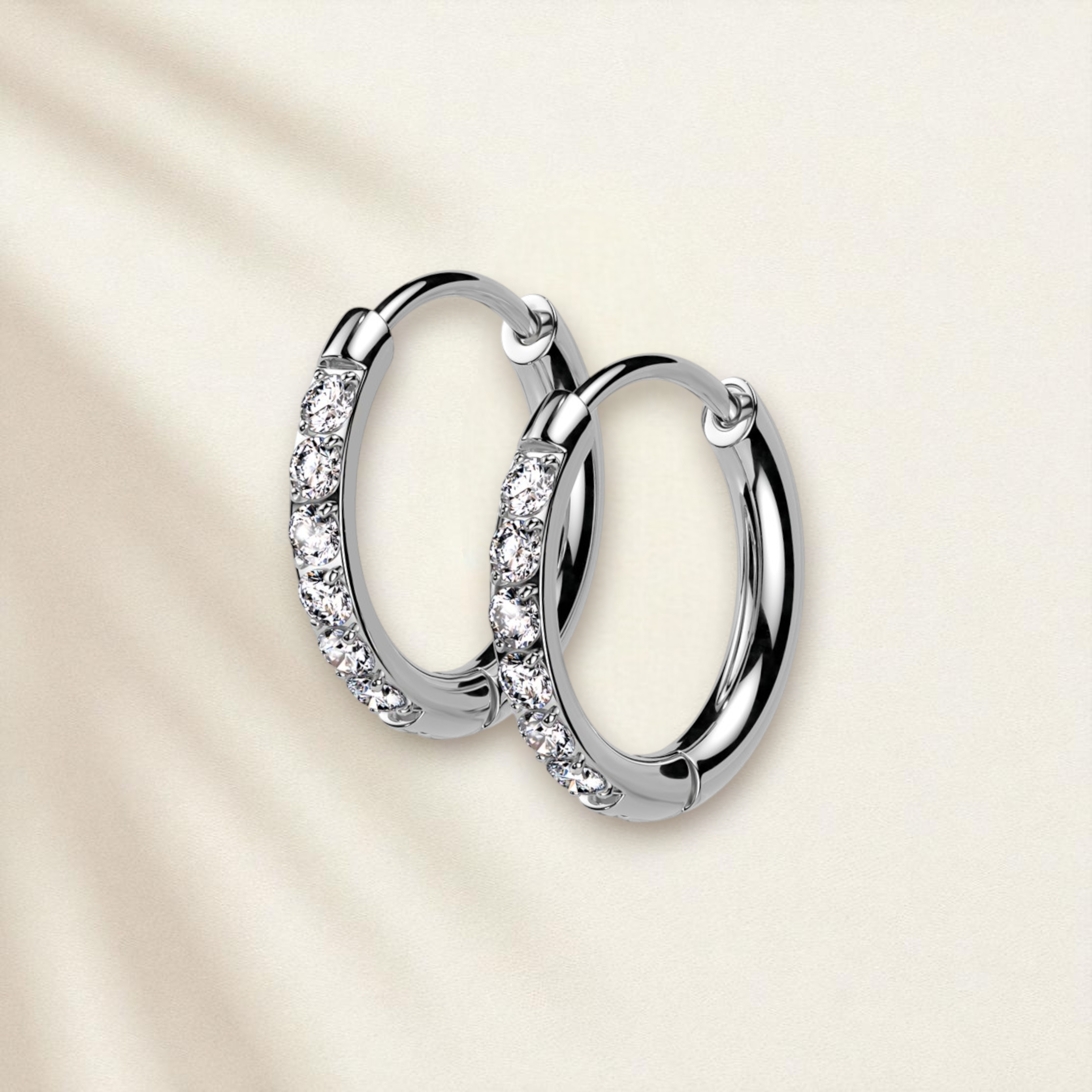 Silver Huggie Hoop Clicker Earrings with CZs across the front of hoop