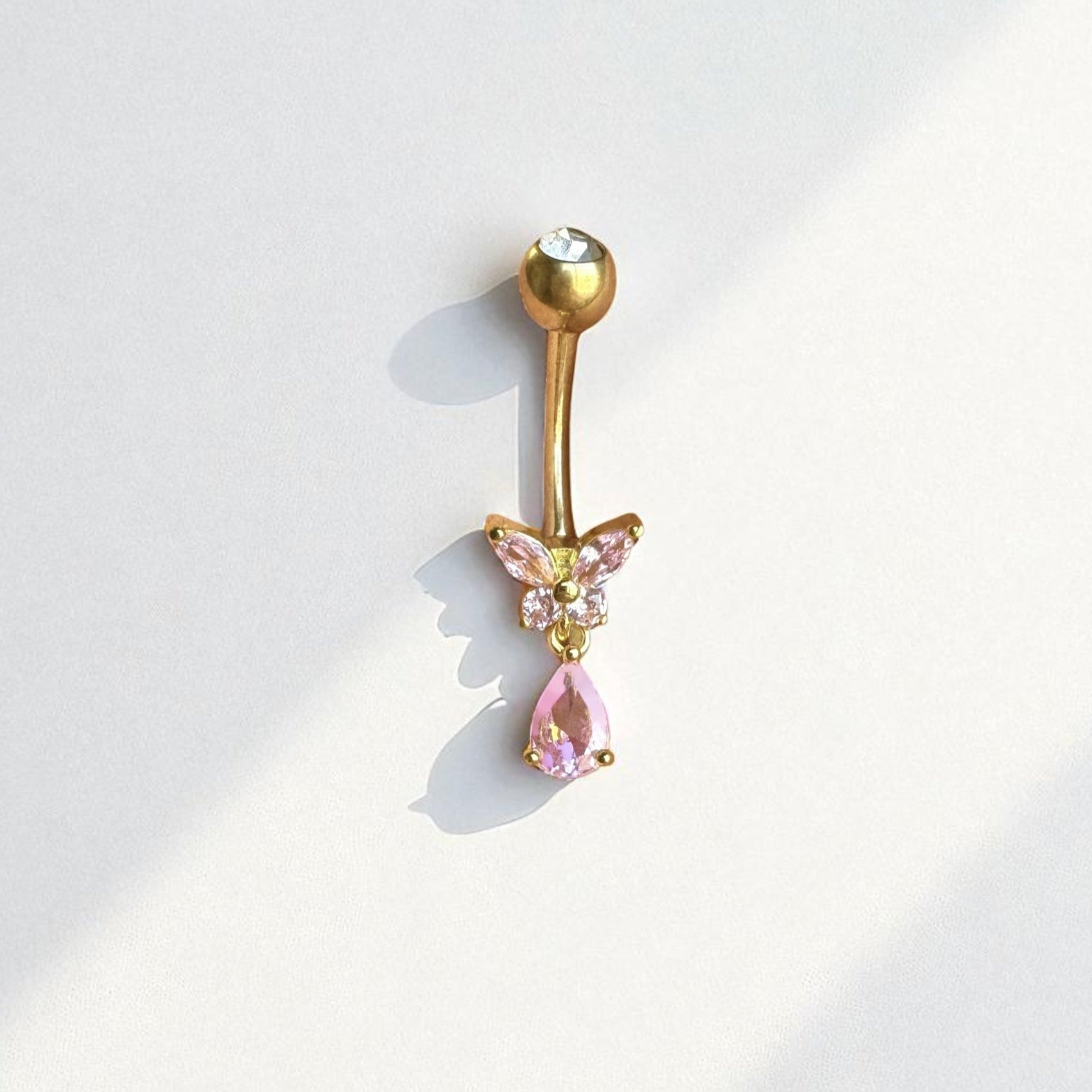 Gold belly button ring with butterfly made of pink gems