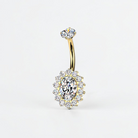Gold titanium belly button ring with oval clear CZ and halo design, internally threaded navel jewelry