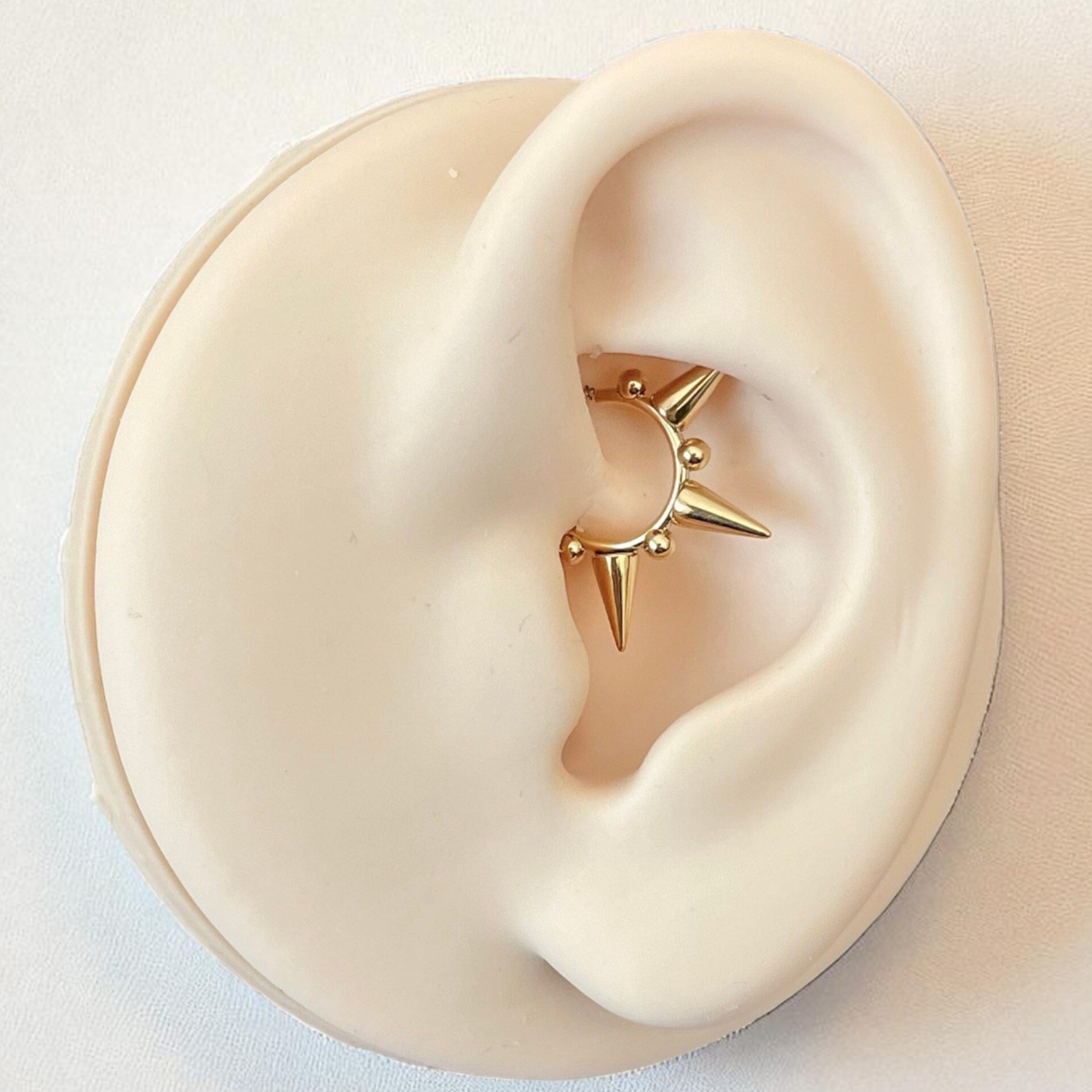 Gold spiked daith earring
