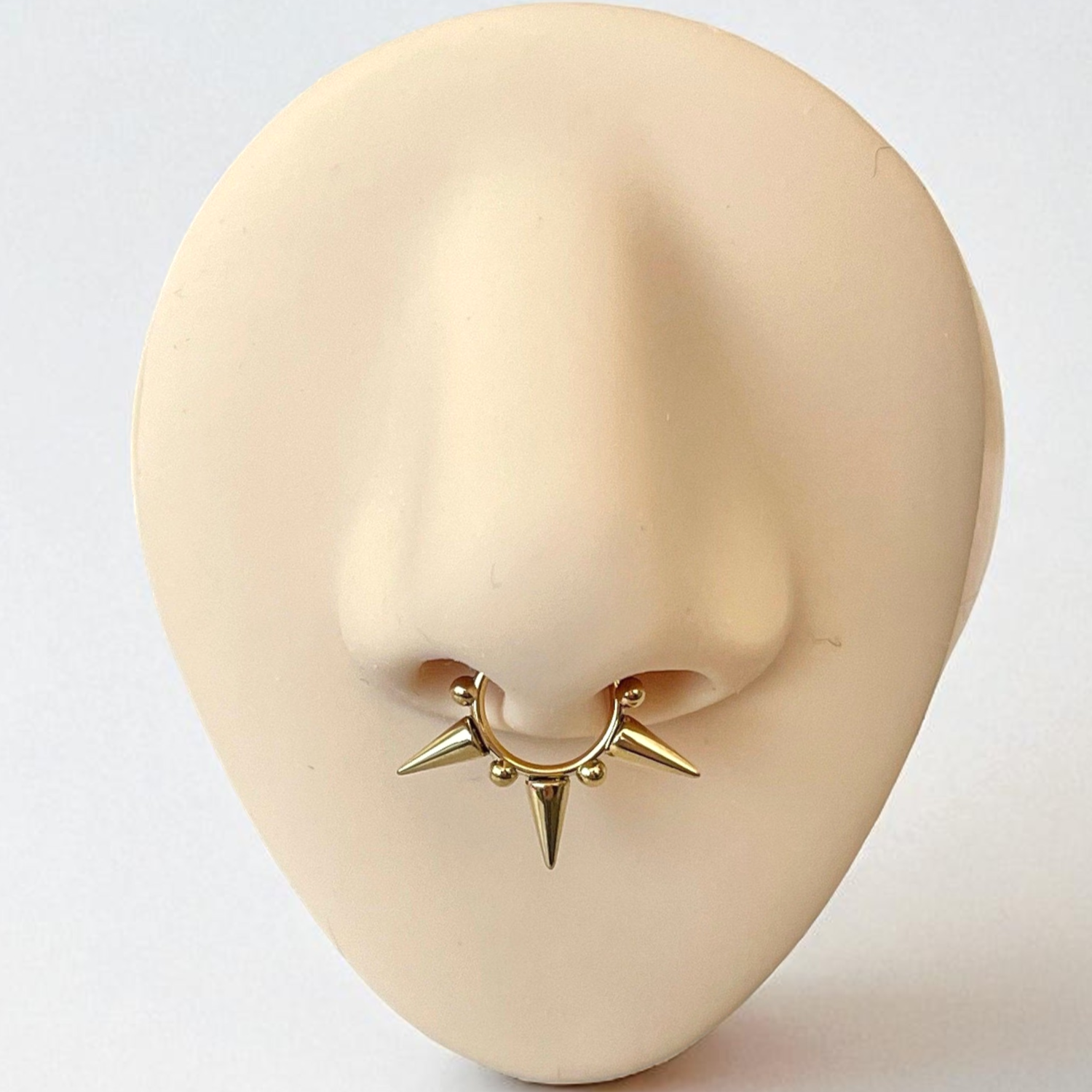 spiked gold septum ring