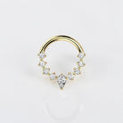 Elara Body Jewelry gold teardrop septum ring with clear CZ stones, hinged segment design.