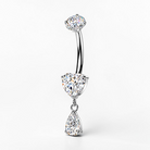 Titanium belly button ring with heart-shaped CZ and dangling teardrop stone