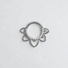 Silver fan shaped  daith earring with embedded CZ crystals on a light gray background