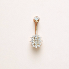 Gold belly button ring with clear gemstones