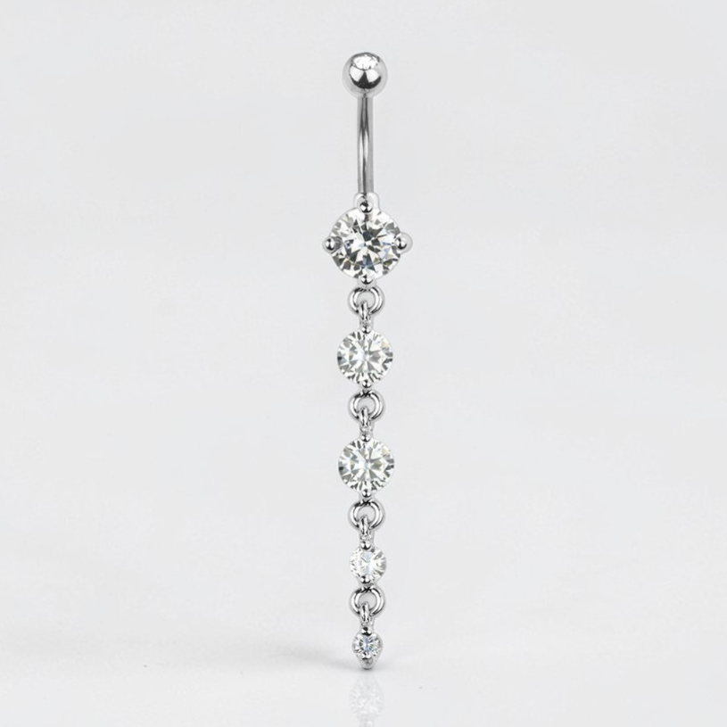 Silver belly button ring with dangling crystals on a white background