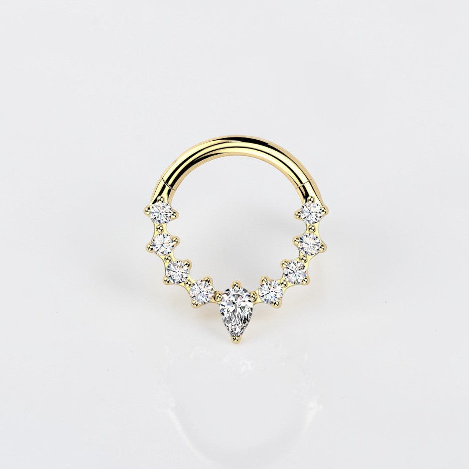 Elara Body Jewelry gold teardrop septum ring with clear CZ stones, hinged segment design.