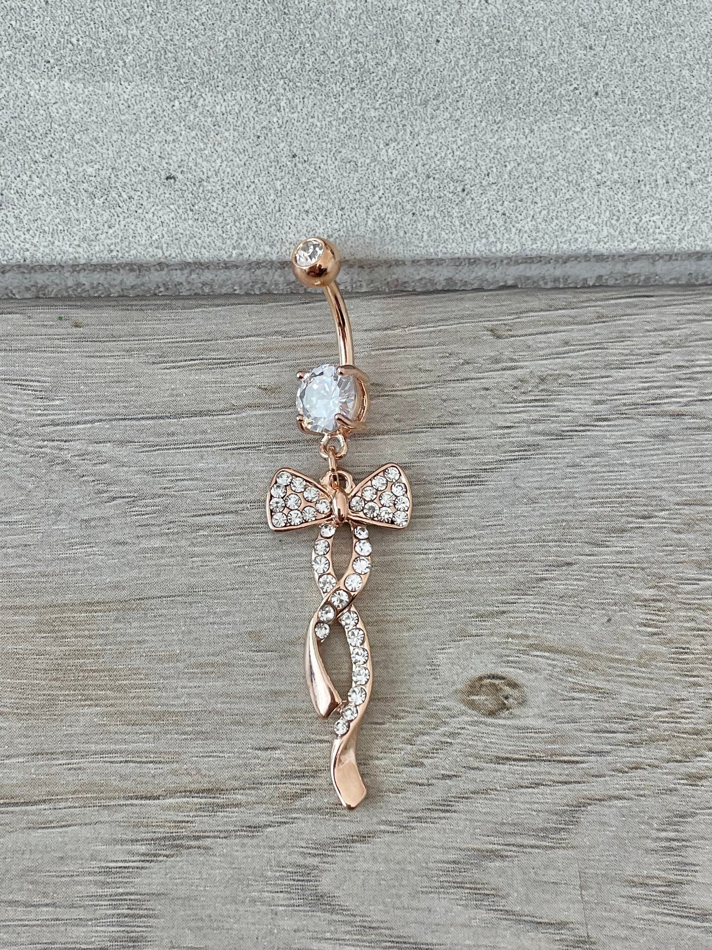 Rose Gold Dangly Bow Belly Button Ring (14G, 10mm, Surgical Steel)