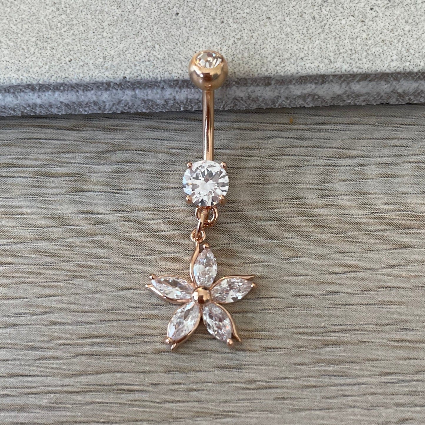 Rose Gold Dangling Hibiscus Belly Button Ring (14G | 10mm | Surgical Steel)